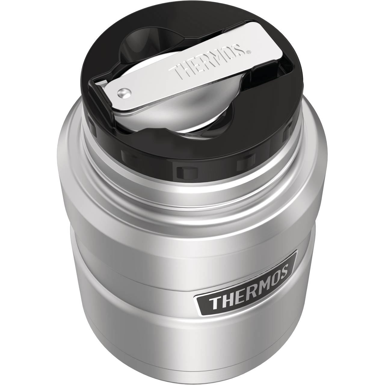 Auf dem Bild ist ein silberner Thermobehälter zu sehen, die zylindrisch geformt ist. Sie hat einen schwarzen Deckel mit einem silbernen Griff und den Schriftzug "THERMOS" an der Seite.